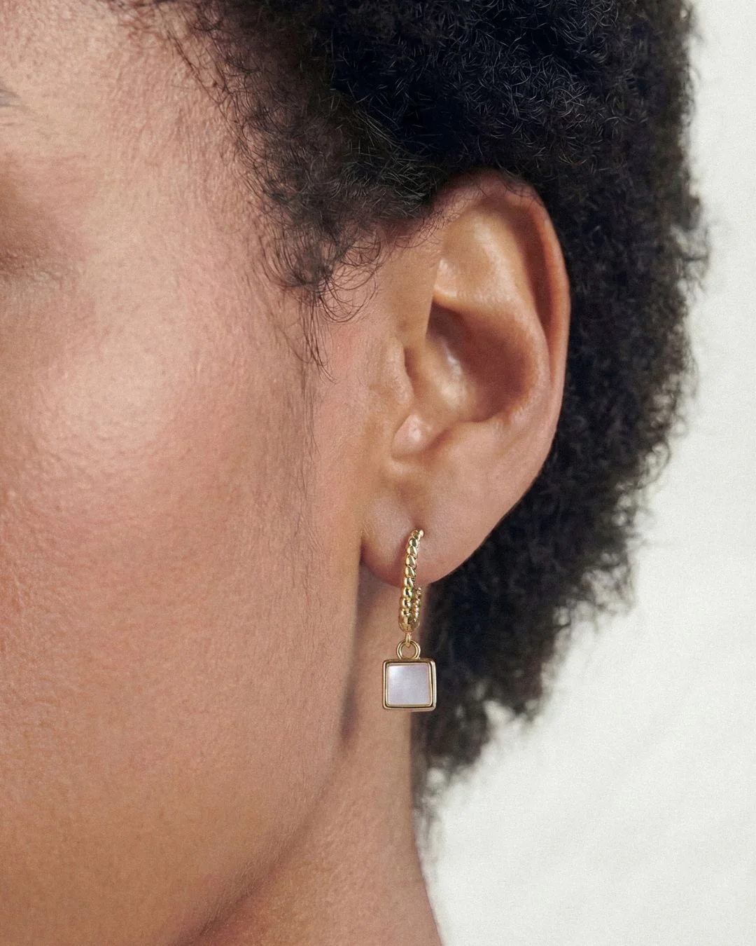 MOTHER-OF-PEARL CHARLOTTE DROP HUGGIE HOOPS - Image 2