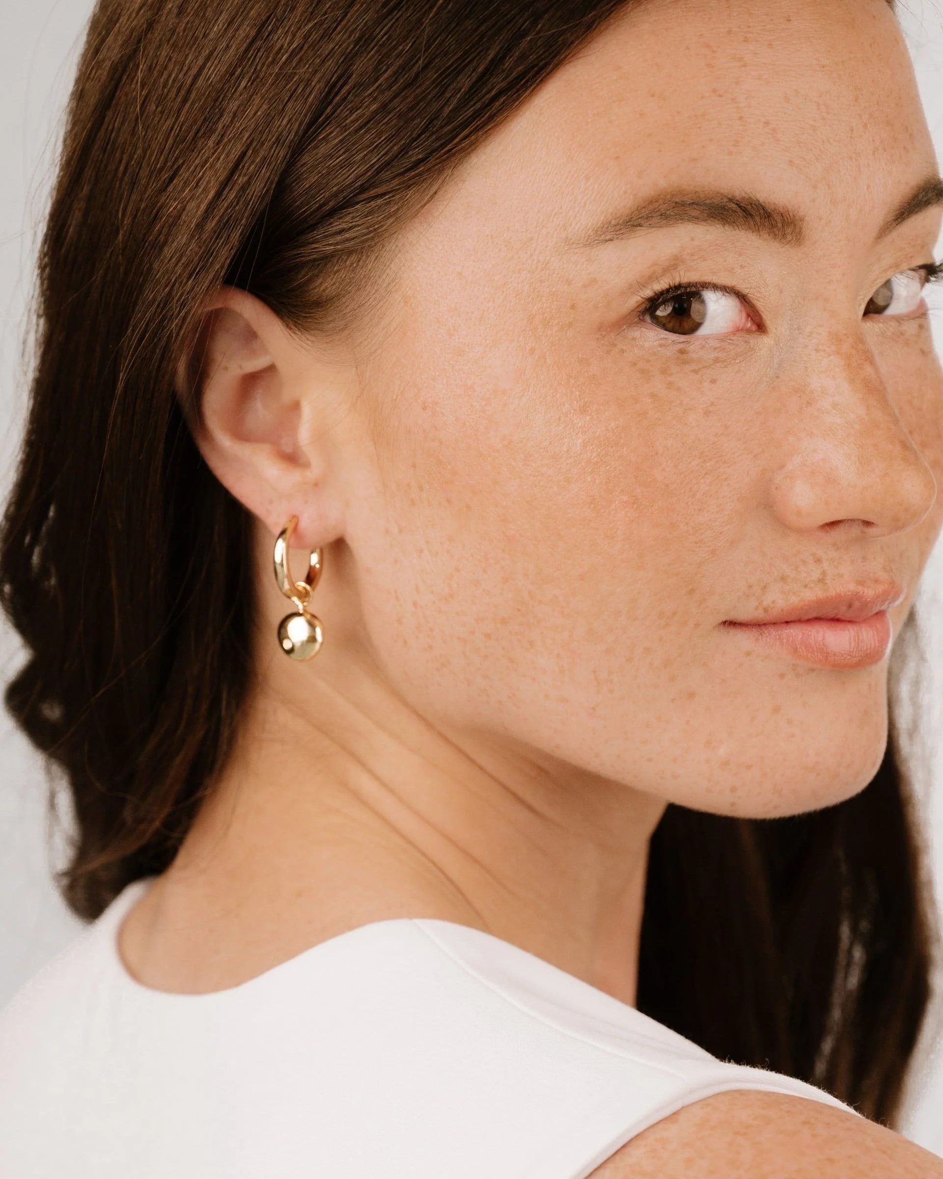 Polished Pebble Huggie Hoop Earrings - Image 12